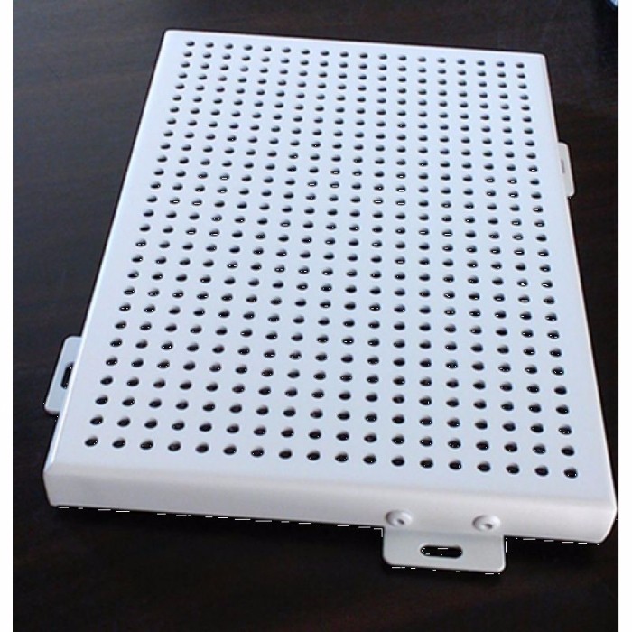 How is punched aluminum veneer produced